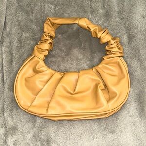 Small purse. Never worn before.